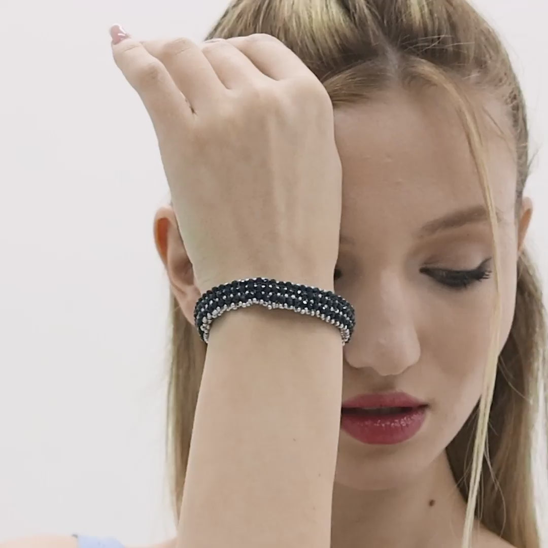 Discover the beauty and craftsmanship of our Handcrafted Amethyst and Gray Natural Stone Bead Bracelet in this video. Featuring stunning amethyst and gray stones, this unique boho jewelry piece is designed to promote healing energy while adding elegance to your style. Perfect for everyday wear or as a thoughtful gift, watch how this artisan-crafted bracelet can enhance any outfit